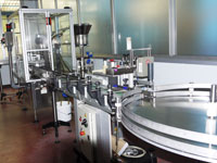 Linea riempimento liquidi automatica